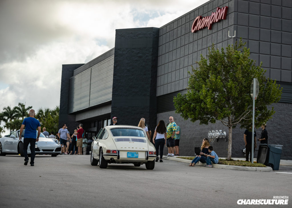 Porsche driving into Cars & Brunch 4 at Champion Porsche