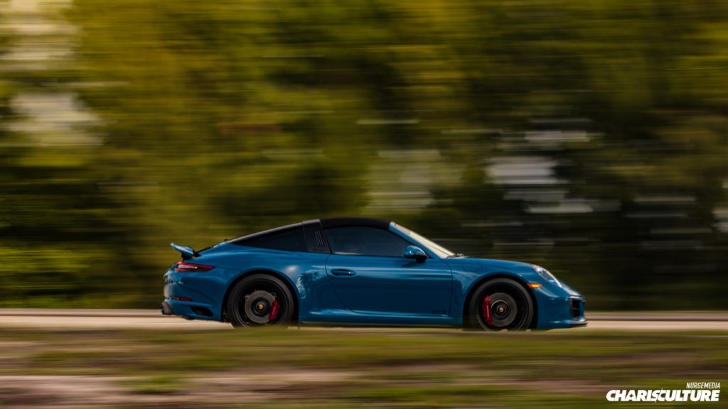 Porsche 911 Cabrio driving to Cars & Brunch 4 at Champion Porsche